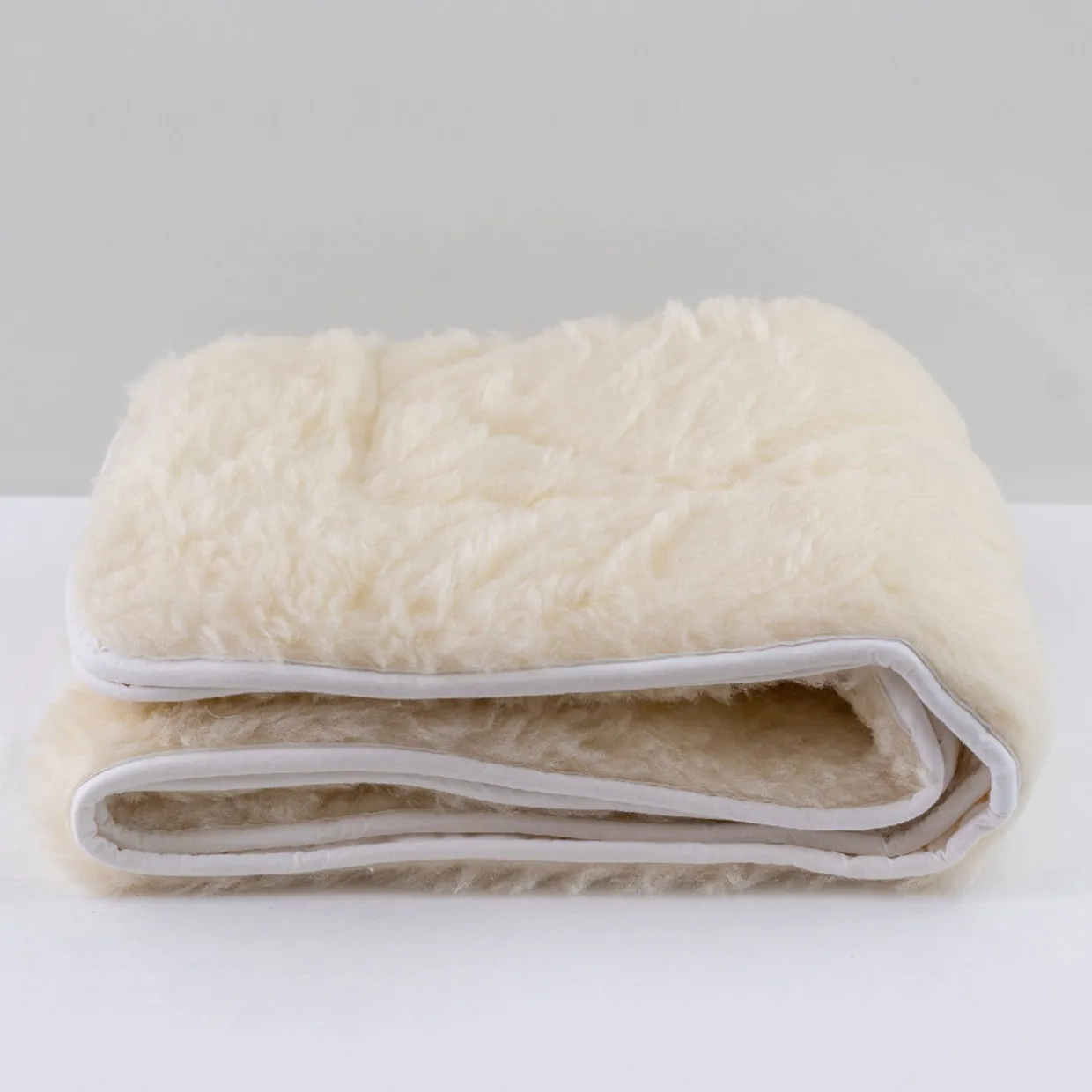 Reversible Quilted Wool Underlay - Cot Size